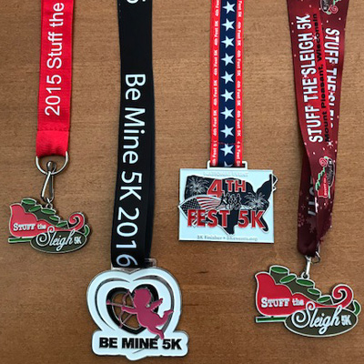 Distribute Finisher Medals - KY Run