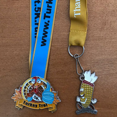 Distribute Finisher Medals - KY Run